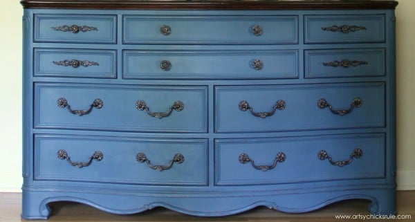 blue dresser with bronze hardware