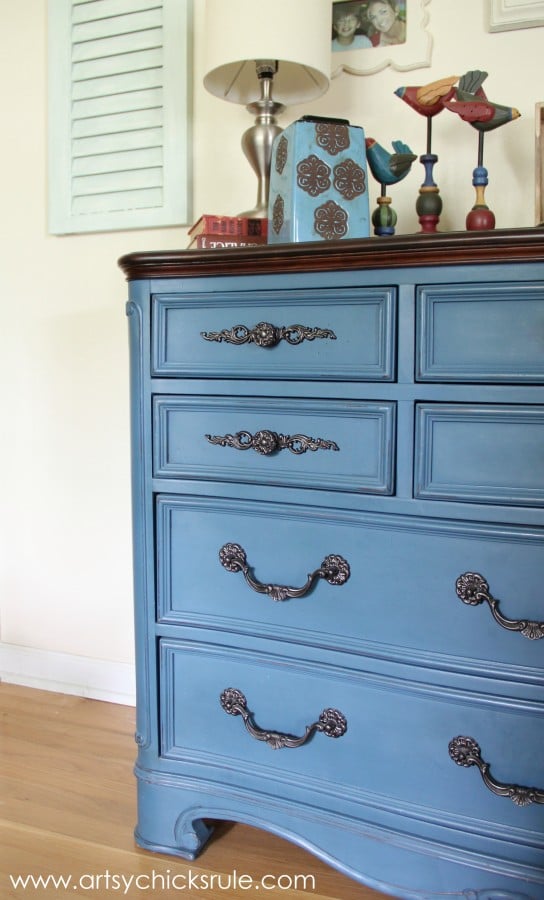 one side of blue dresser