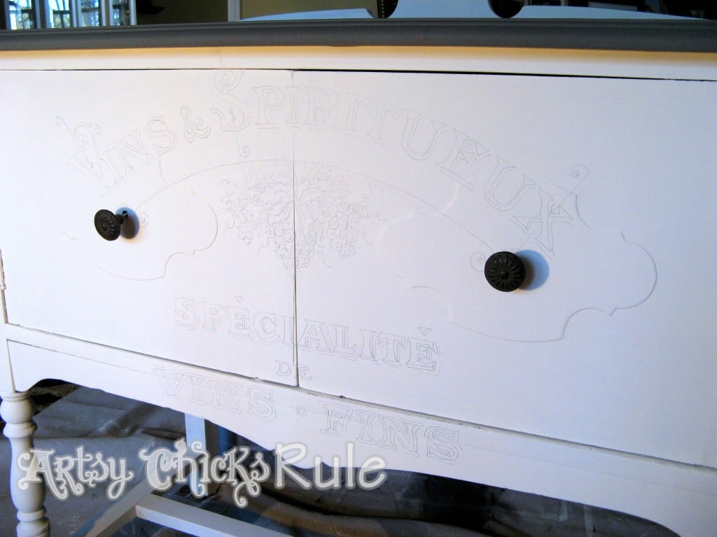 front of sideboard with traced french lettering image