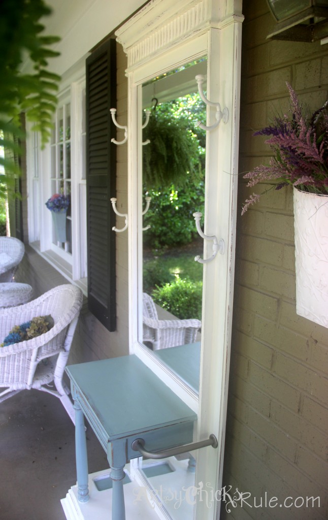 hall tree on porch with hardware added