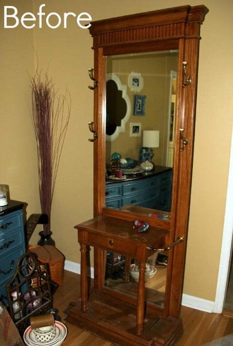wood stained hall tree with mirror