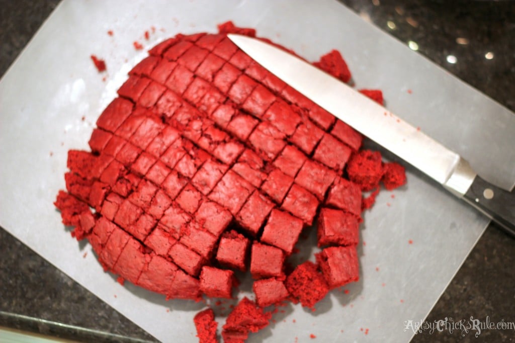 Cutting Red Velvet Cake into Small Squares- #redvelvet arstychicksrule.com BEST dessert!! So easy, love this Red Velvet Trifle!! artsychicksrule.com #redvelvet #redvelvetcake #redvelvettrifle 