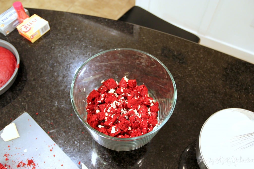 Layer of Red Velvet Squares in the Bottom of the Trifle Bowl (shaved white chocolate sprinkled on top)