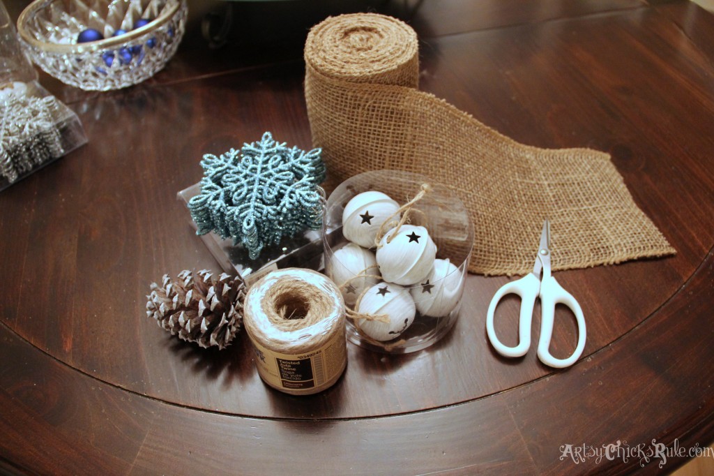 Ornaments, jingle bells, twine, burlap and pine cones for chair decor