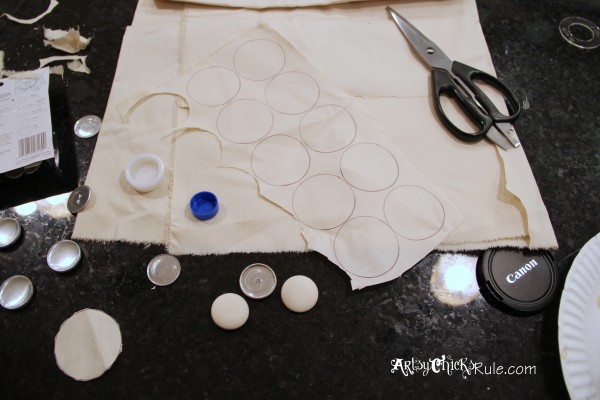 fabric with circles drawn, scissors