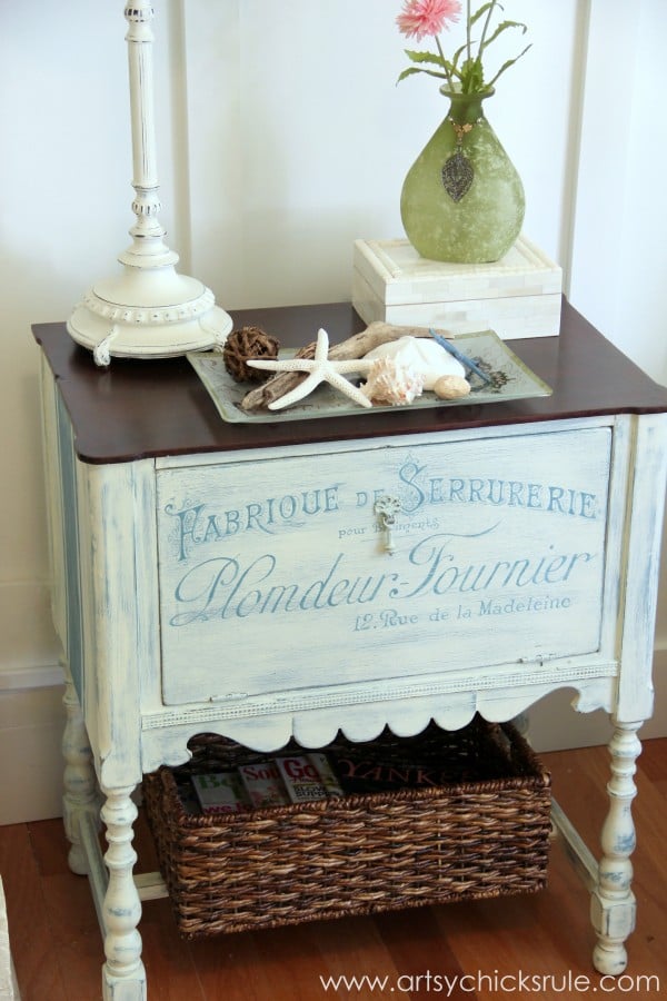 french styled cbinet with curvy legs and seashells on top