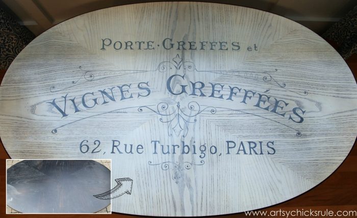 top view of oval table with French script painted on