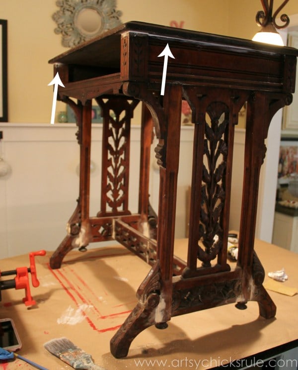 wood desk with caulk at the top seam