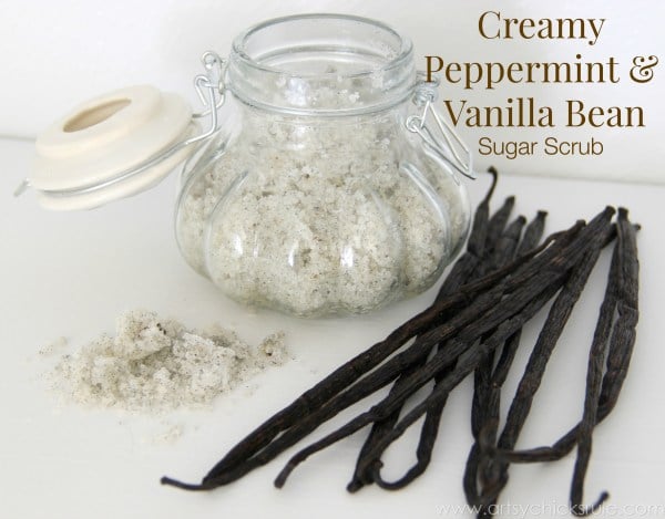 white sugar scrub in a jar with vanilla beans on side