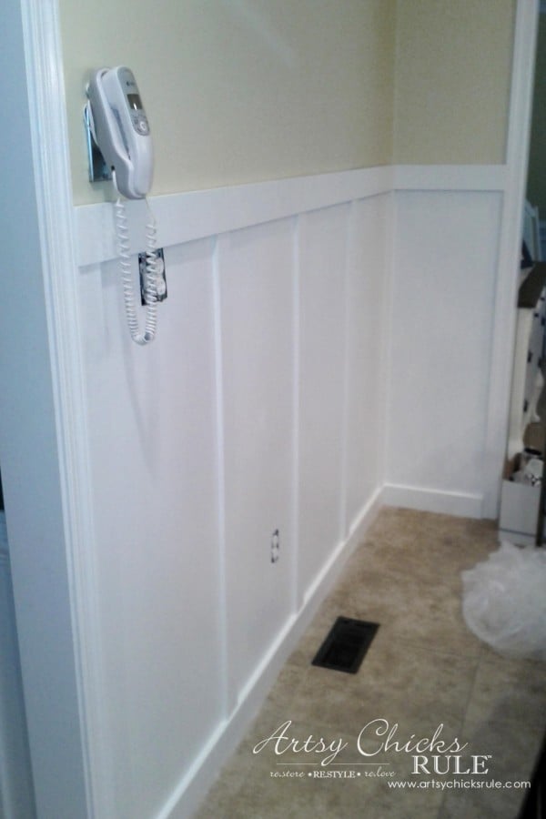 white and wood kitchen wall with yellow above