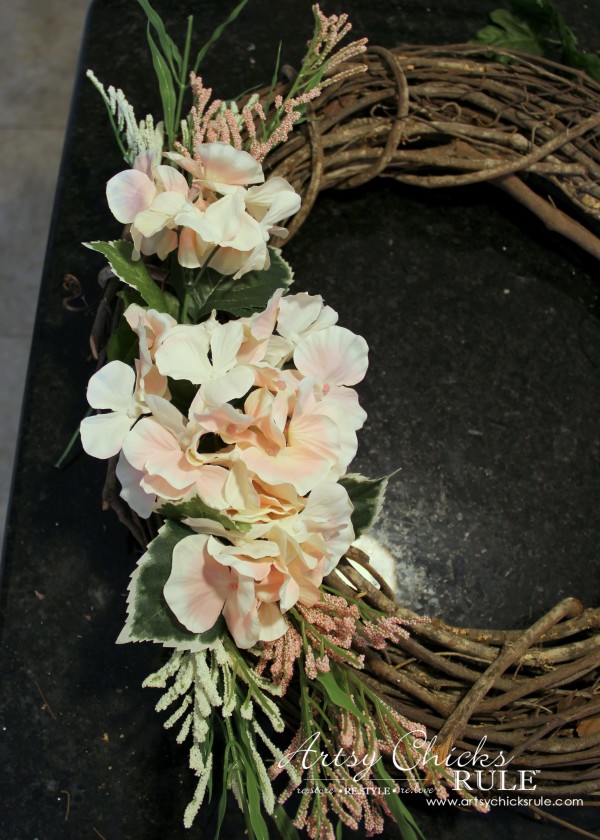 Easy DIY Floral Wreath - Adding as I go using leftover sprigs #wreath artsychicksrule.com