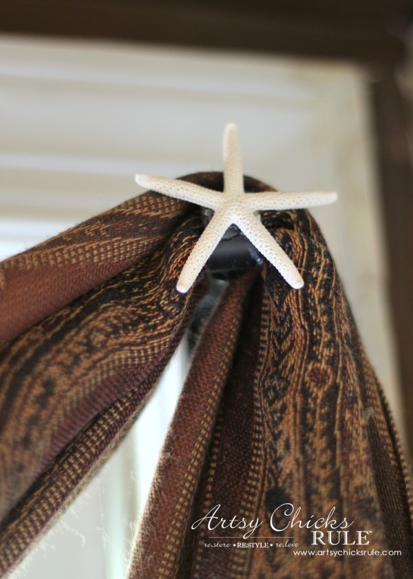 (Simple) Inexpensive Window Treatment Idea - Glue starfish for finial and $10 scarf from World Market - artsychicksrule