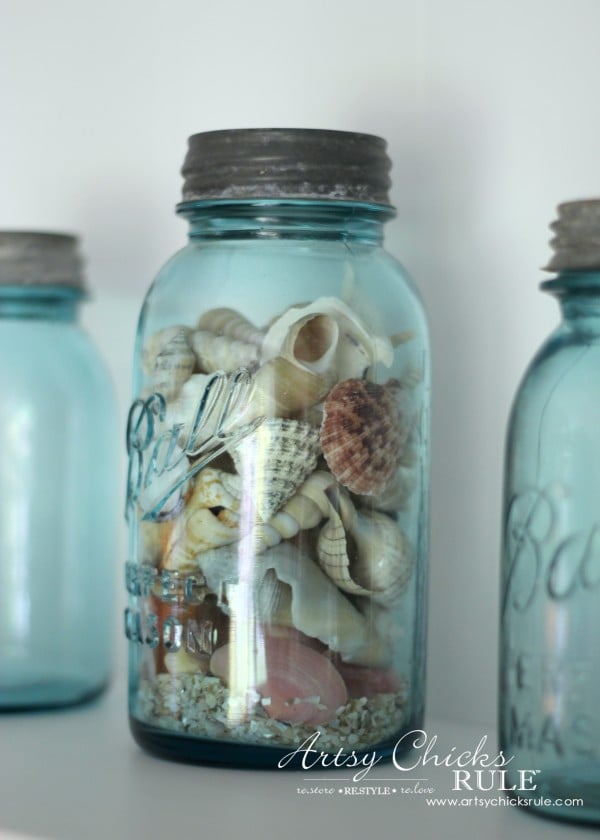 blue mason jars with seashells