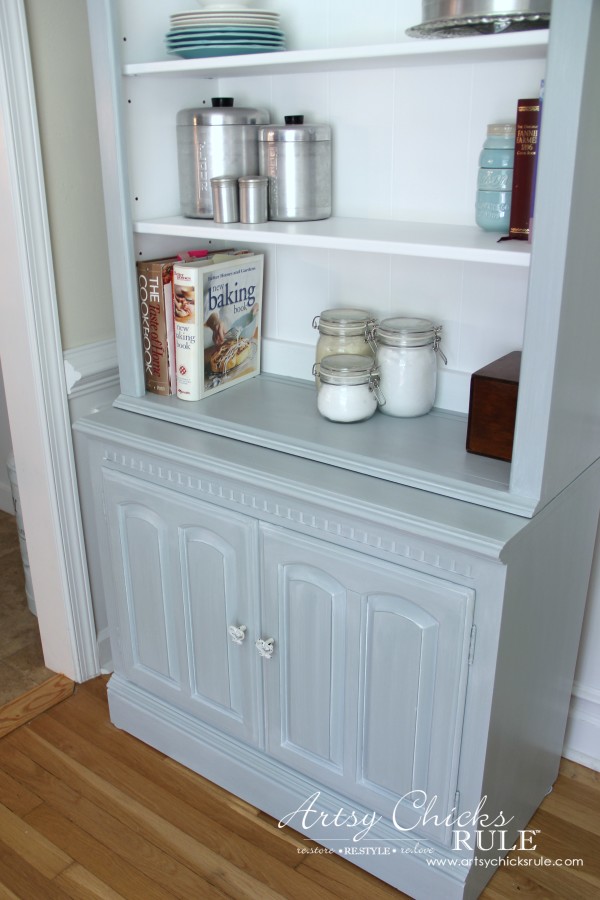 baking cabinet bookcase with baking things