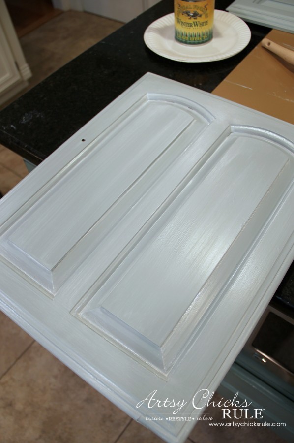 showing how the white glaze looks over the blue paint