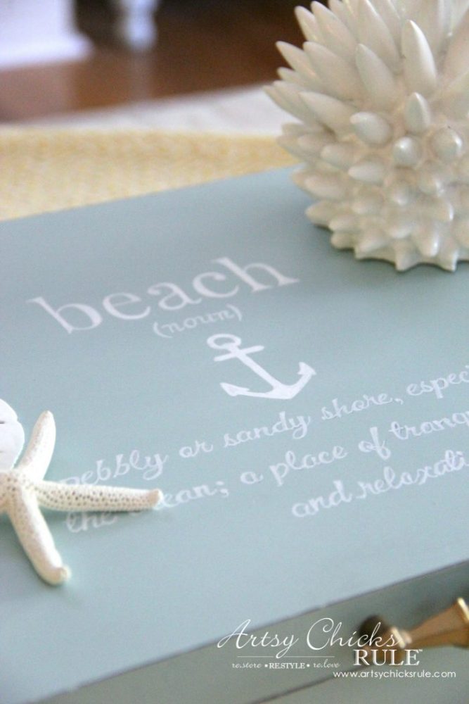 blue beach box with shells