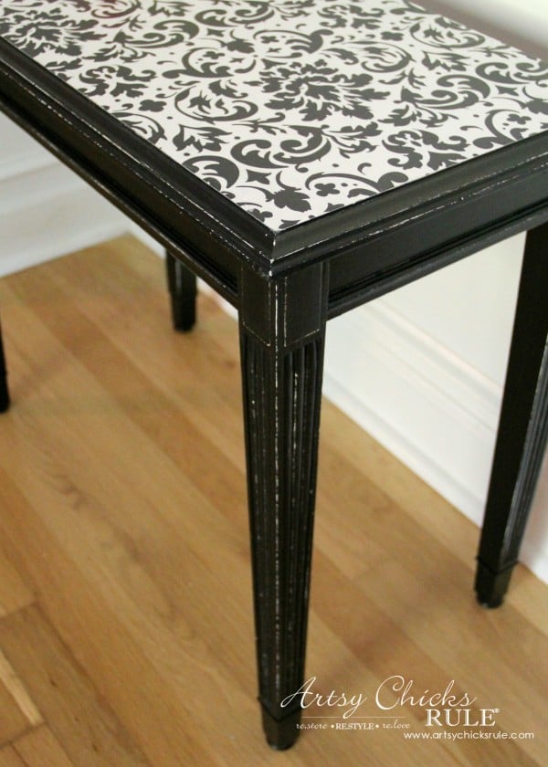 black table with paper on top