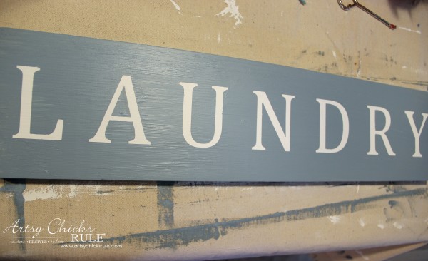 Antiqued Laundry Sign - painted blue and vinyl letters removed - artsychicksrule #laundrysign #diylaundrysign
