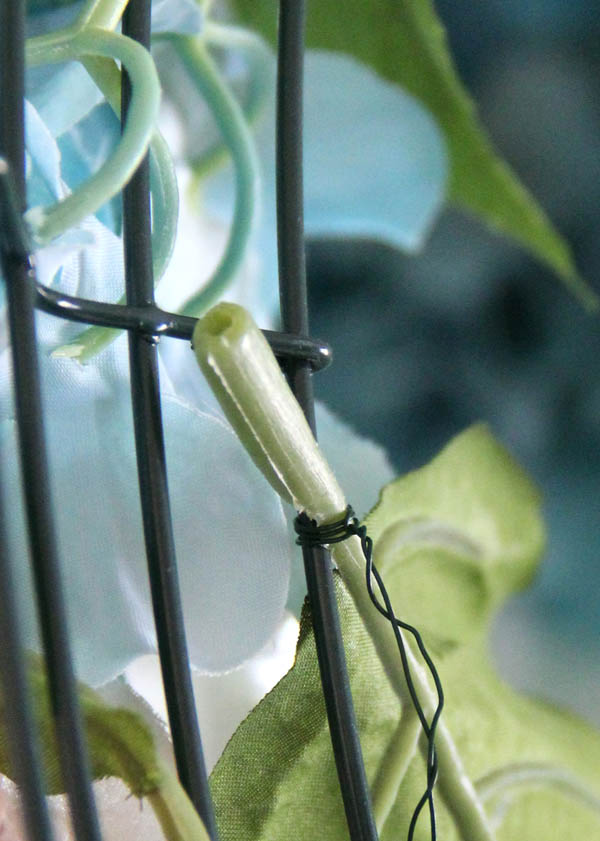 DIY Hydrangea Wreath - using wire to add leaves - DIY Hydrangea Wreath - Colorful Spring Wreath - artsychicksrule.com #hydrangeawreath #springwreath
