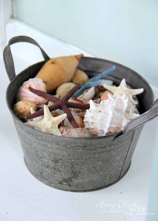 Thrifty Porch Decor - Pail with Seashells - artsychicksrule.com #frontporchdecor