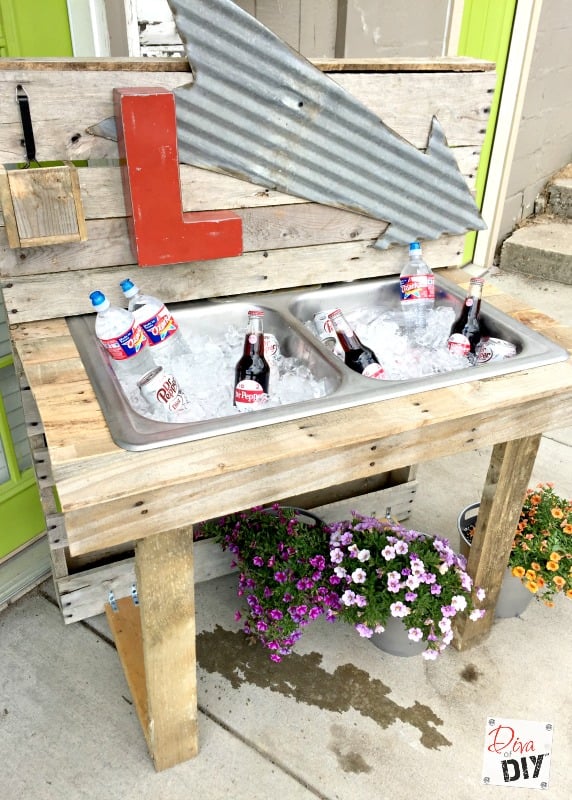 A drink station made of pallets.