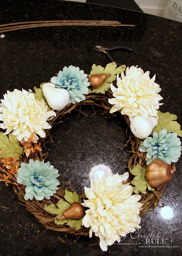 Want to ease into fall from summer? Or live on the coast? Make this SIMPLE coastal fall wreath which incorporates a little of both! artsychicksrule.com #coastalfallwreath