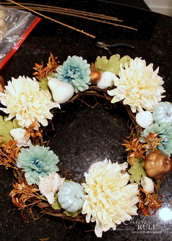 Want to ease into fall from summer? Or live on the coast? Make this SIMPLE coastal fall wreath which incorporates a little of both! artsychicksrule.com #coastalfallwreath