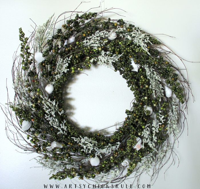 front view of wreath on white wall