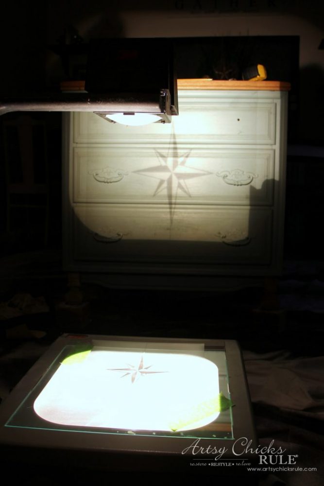 projector with design onto front of dresser 