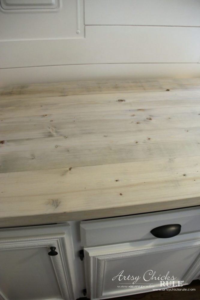 Farmhouse Style and Easy!! How To Make DIY Wood Countertop - first coat artsychicksrule.com #woodcountertops #diywoodcountertop #howtobuildcountertop 