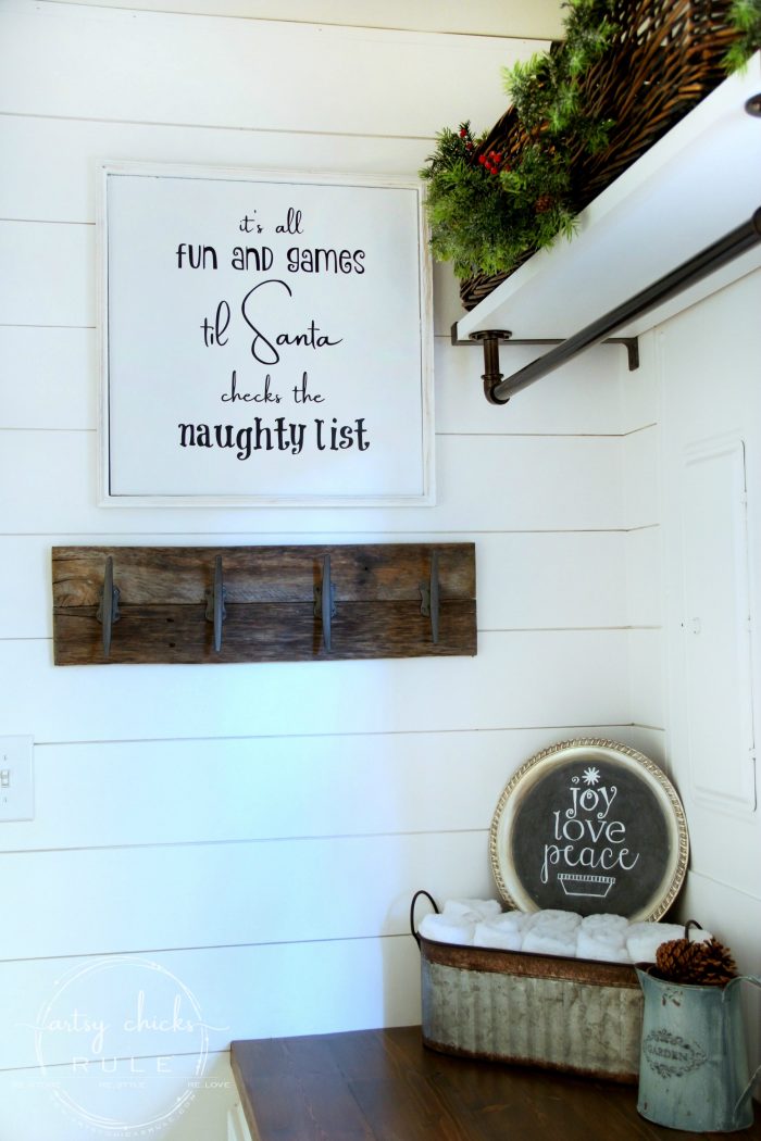 A festive Christmas laundry room!! Lots of coastal touches too! artsychicksrule.com #coastalChristmas #Christmasdecor #Christmaslaundry #laundryroom #holidaydecor #holidayideas