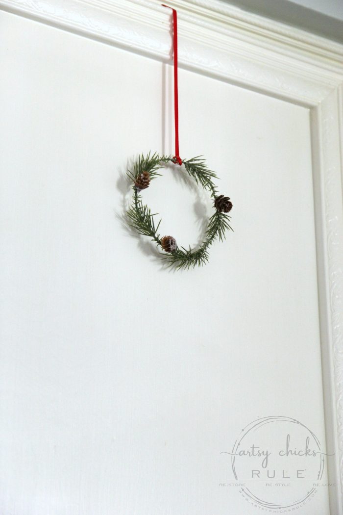 These wispy little DIY mini wreaths are so easy to make! And budget friendly too! artsychicksrule.com #miniwreaths #diywreaths #christmaswreaths #diyminiwreaths