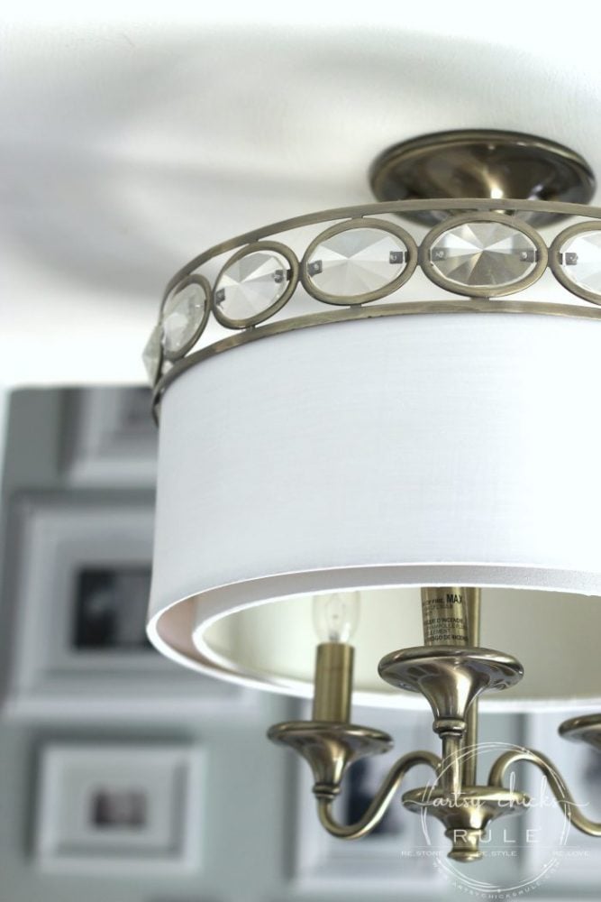 How To Paint Light Fixtures (with this simple trick!!) artsychicksrule.com #paintlightfixtures #paintedlightfixtures #paintedchandelier #fauxverdigris #fauxpatina #chalkpaint #chalkpaintedlight