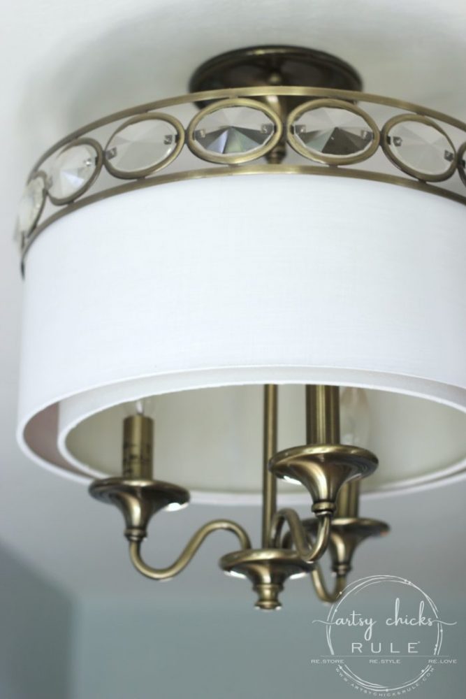 white lampshade with light fixture