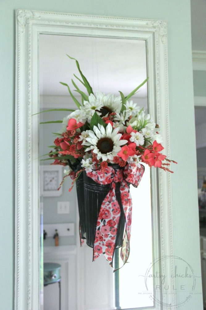 Flower Pail Wreath - EASY Wildflower Look!! artsychicksrule.com #flowerpailwreath #uniquewreathideas #wildflowerwreath #floralwreath #floralwallhanging #floralarrangement #flowercrafts #diywreath