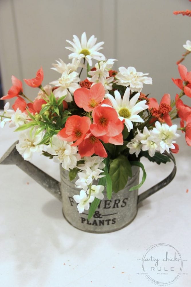 Unique Summer Wreath Idea!! Watering Can with Flowers to hang OR display on a shelf, etc. artsychicksrule.com #wateringcanwreath #uniquewreathideas #summerwreath #wildflowerwreath #wreathideas #summerdecor