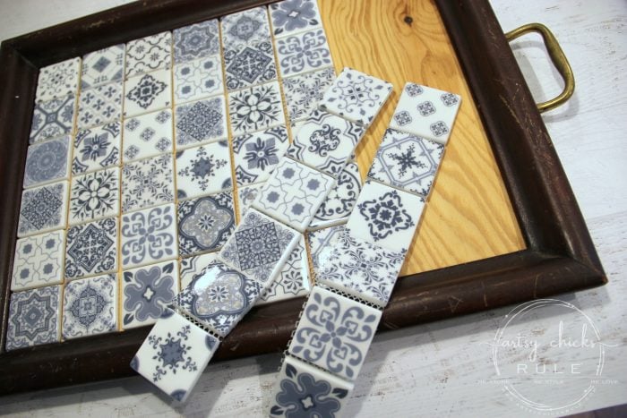 DIY Navy Blue and White Tile Tray....From Thrift Store Find! artsychicksrule.com #blueandwhitetile #blueandwhitedecor #tileideas #thriftymakeover #trashtotreasure #blueandwhite #blueandwhitepillows