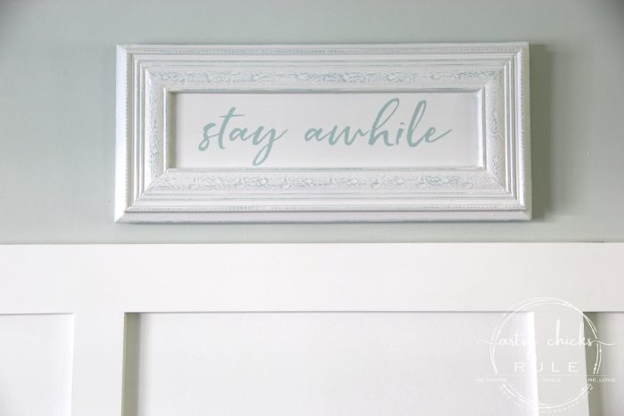 Make Your Own Stay Awhile Sign With This FREE Printable (hang it up) artsychicksrule.com #repurposed #cabinetdoorideas #stayawhile #diysign #freeprintable #cabinetdoorrepurposed #silhouetteprojects