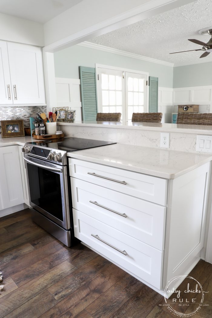 DIY Coastal Kitchen Makeover Reveal!!! White Shaker cabinetd, quartz countertops, farmhouse style flooring and more! artsychicksrule.com #kitchenmakeover #kitchenremodel #diykitchen #coastalkitchen #quartzcountertops #farmhouseflooring