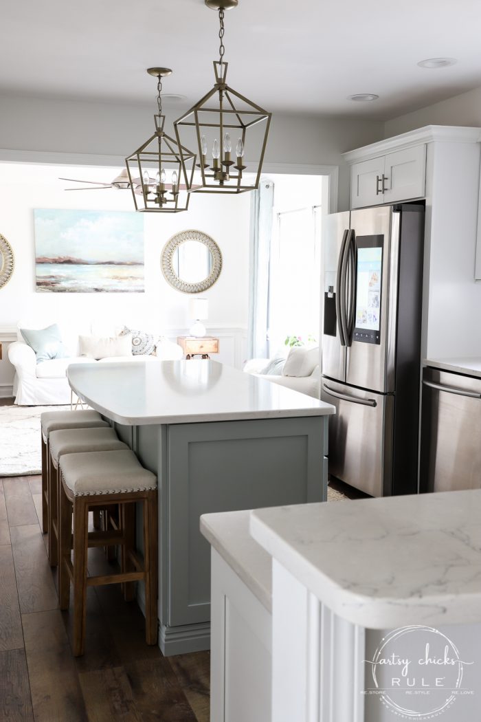 DIY Coastal Kitchen Makeover Reveal!!! White Shaker cabinetd, quartz countertops, farmhouse style flooring and more! artsychicksrule.com #kitchenmakeover #kitchenremodel #diykitchen #coastalkitchen #quartzcountertops #farmhouseflooring