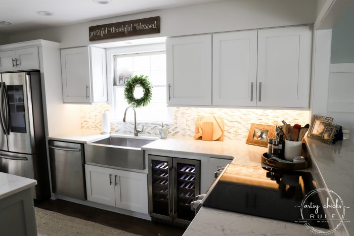 DIY Coastal Kitchen Makeover Reveal!!! White Shaker cabinetd, quartz countertops, farmhouse style flooring and more! artsychicksrule.com #kitchenmakeover #kitchenremodel #diykitchen #coastalkitchen #quartzcountertops #farmhouseflooring