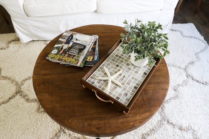 Thrift Store Makeover with TILE!! Simple makeover using an old, framed print. Just add hardware and cute little feet! artsychicksrule.com #tiledtray #tileprojects #thriftstoremakeover #thriftydecor