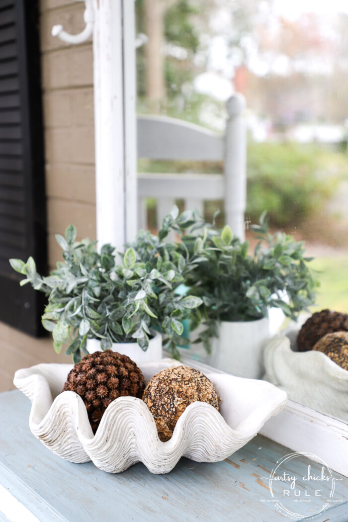 This sweet antique mailbox makes the perfect spot for spring flowers!! Even if it's the wrong color! Just paint it! artsychicksrule.com porch decor