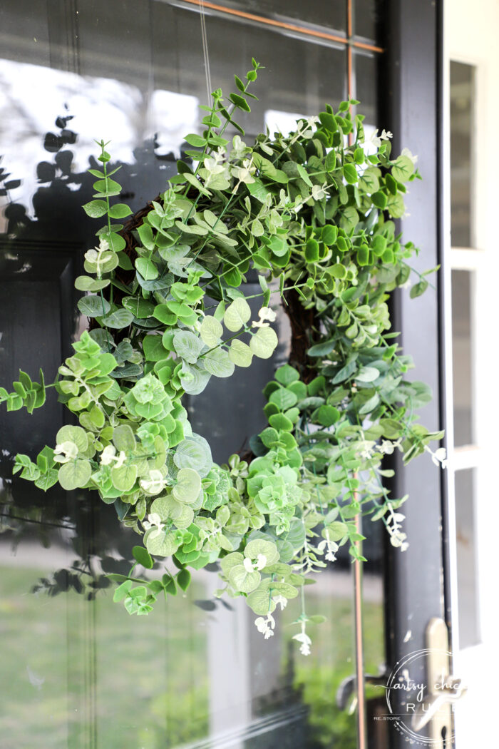 This sweet antique mailbox makes the perfect spot for spring flowers!! Even if it's the wrong color! Just paint it! artsychicksrule.com eucalyptus wreath