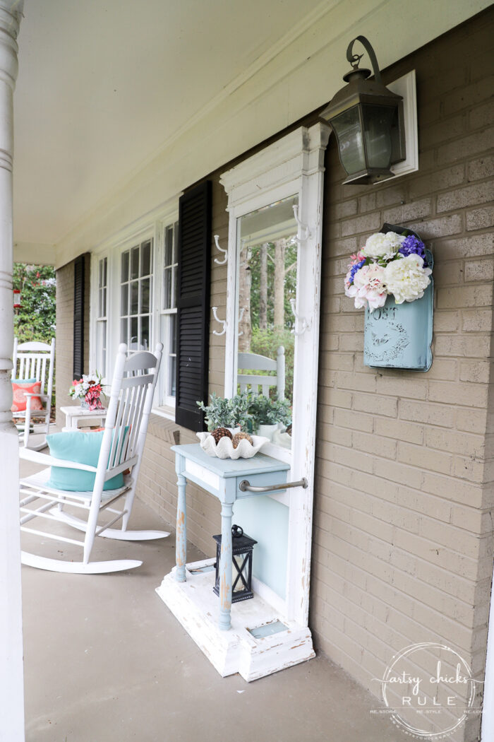 This sweet antique mailbox makes the perfect spot for spring flowers!! Even if it's the wrong color! Just paint it! artsychicksrule.com rockers on porch