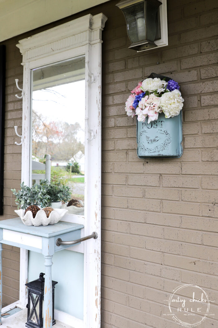 This sweet antique mailbox makes the perfect spot for spring flowers!! Even if it's the wrong color! Just paint it! hall tree on porch