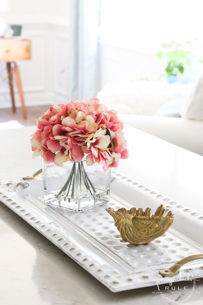 Pink flowers on white and gold tray with gold seashell artsychicksrule.com