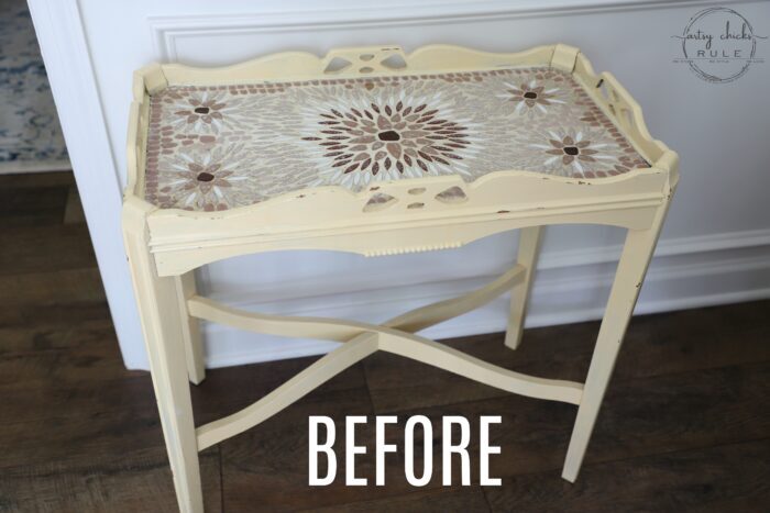 This old thrift store table had a dated tiled top! SO simply updated by painting!! The painted tiles look amazing now! artsychicksrule.com #paintedtile #paintingtiles #chalkpaintedfurniture #paintedfurniture #whitefurniture