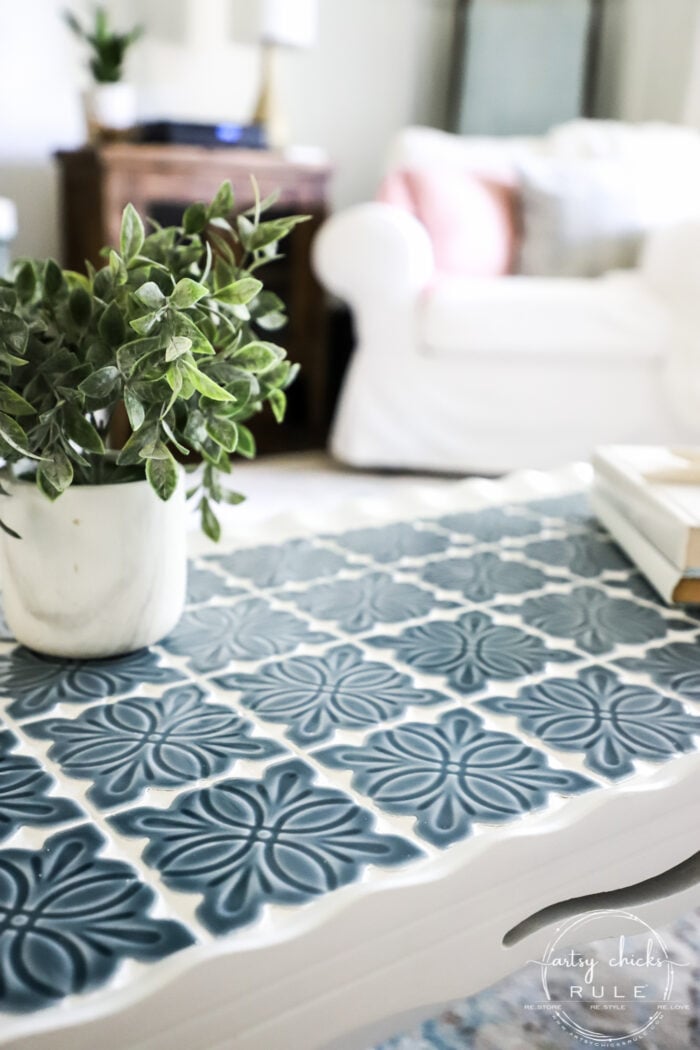 How To Tile A Table Top....easier than you think! Use this simple trick to tile all the things...furniture, decor and more! artsychicksrule.com #howtotile #tileatabletop #blueandwhitetile #furnituremakeover #paintedfurniture