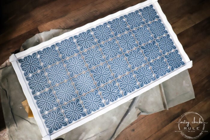 How To Tile A Table Top....easier than you think! Use this simple trick to tile all the things...furniture, decor and more! artsychicksrule.com #howtotile #tileatabletop #blueandwhitetile #furnituremakeover #paintedfurniture